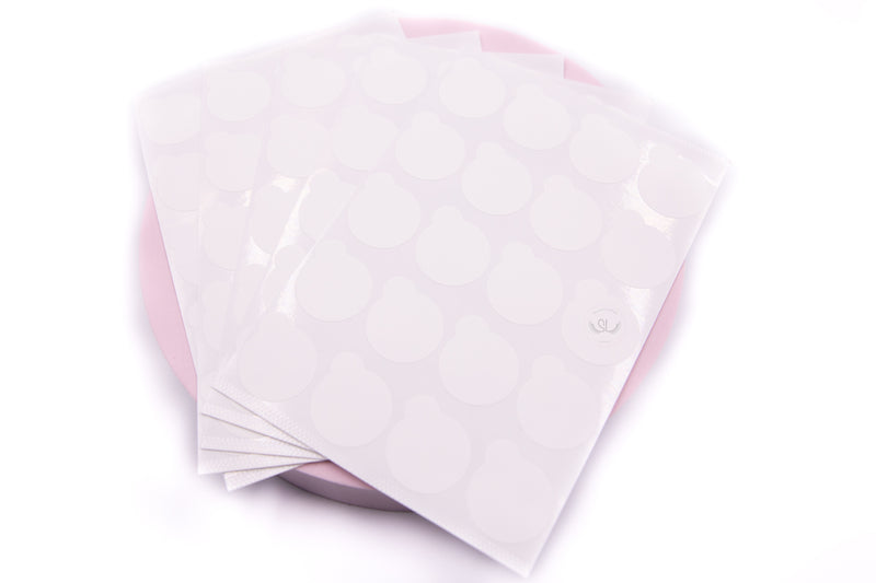 Our Disposable Paper Glue Sticker is perfect to be used with our Jade Stone Glue Holder to keep the stone free of glue residue. Simply attach a glue sticker onto the Jade Stone Glue Holder, then place a drop of glue on the sticker. Key Features: - Colour: White - Disposable - A pack contains 100 stickers