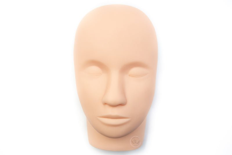 Our Training Mannequin Head is the perfect tool to practice your lashing skills without a live model. Key Features: - It has a flat back to ensure it remains in place while you are lashing. - Materials: High-Quality Soft Silicone - Easy to clean - Simulative of human skin and face size, which makes it easier to lash on live models later.