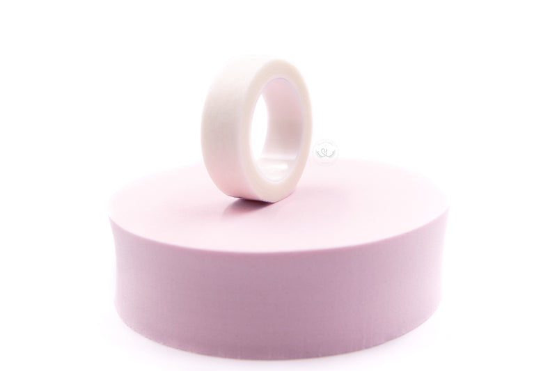 The High Quality Paper Eyelash Tape is used to hold bottom lashes and secure eye gel patches in place during the lashing process. It can also be used to slightly lift the upper eyelids to see natural lashes more clearly. You can use this tape with glue also. Simply attach some Paper Eyelash Tape onto our Jade Stone Glue Holder and add glue.  Key Features:  - Gentle on the skin and does not cause pain when getting removed  - Smooth finish  - Non-woven  - Size: 1.25x900cm